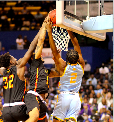 Redshirt Freshman forward, J&#8217;Quan Ewing is rejected by a host of Grambling defenders as a he goes in for the finish. The Jaguars&#160; currently sit atop the SWAC and are&#160; a favorite to win the conference. (DIGEST)
&#160;