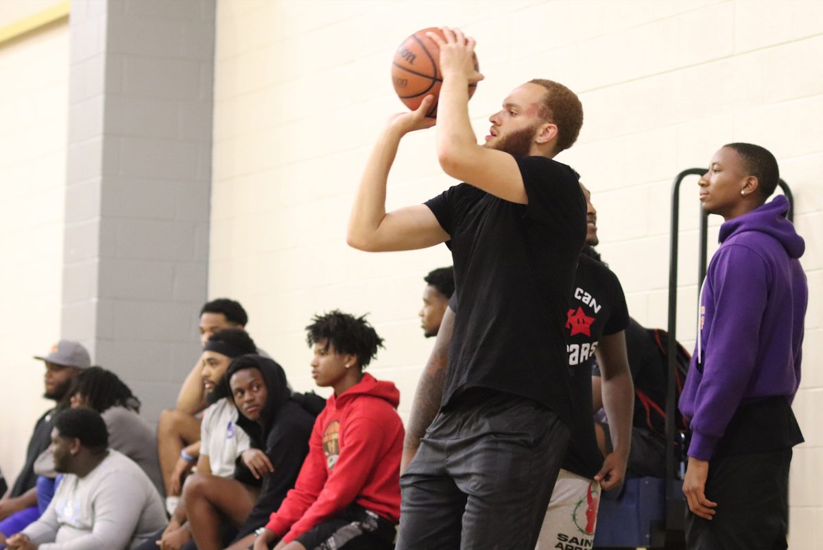 <p>Senior, Niko Harding, warms up before the midnight madness basketball tournament at the Intramural Sports Complex on Thursday, August 25.. (AngellenaFunez/digest)</p>