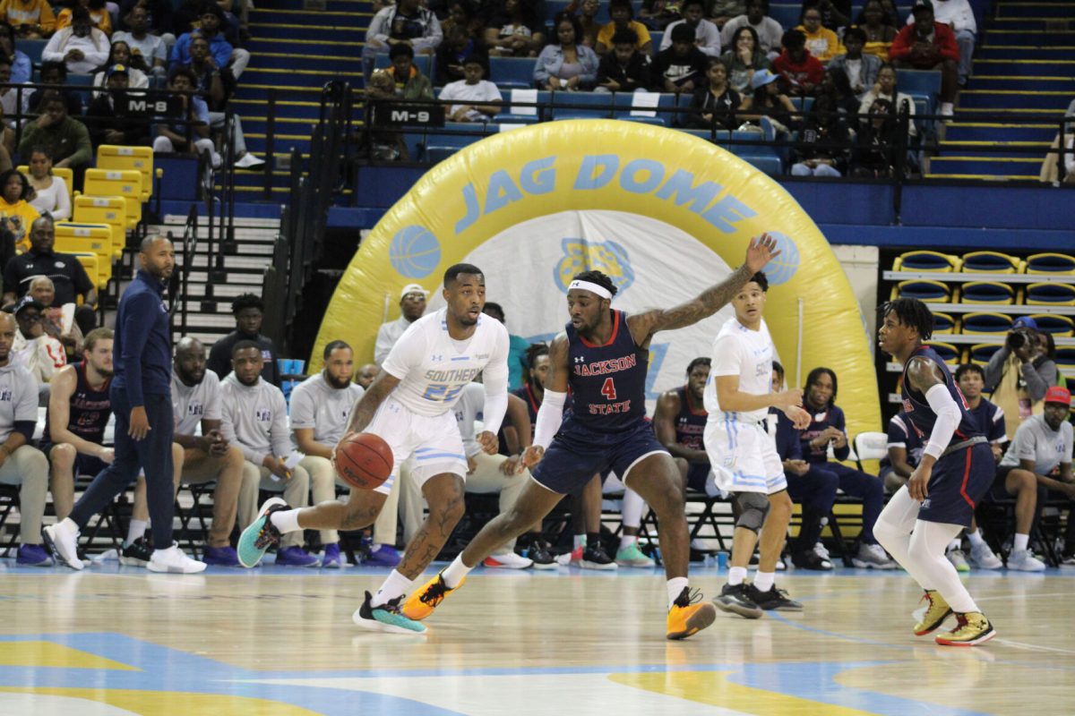 Graduate student Guard, Brion Whitley moving the ball to the hoop during the Jaguars game against Jackson State. (Terren Thomas/DIGEST)