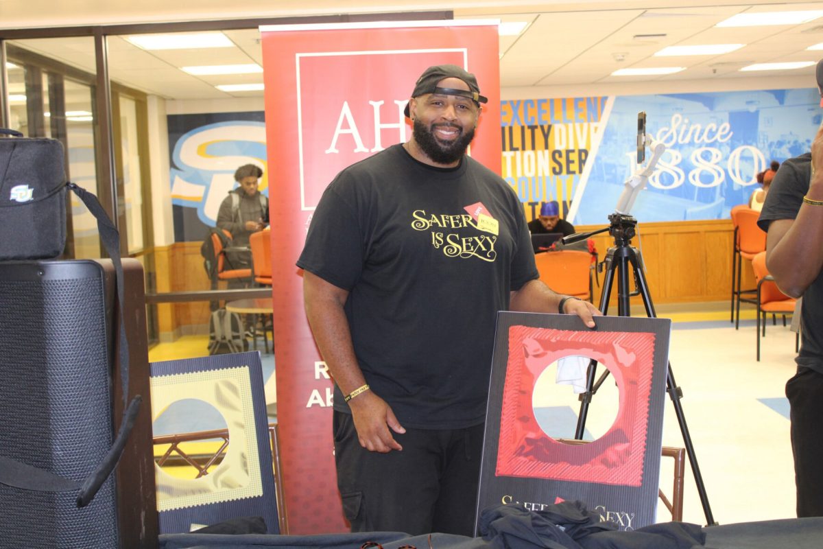 Tony King at the Health Fair in the Union spreading knowedge about how to practice safe sex. (Terren Thomas/ DIGEST)