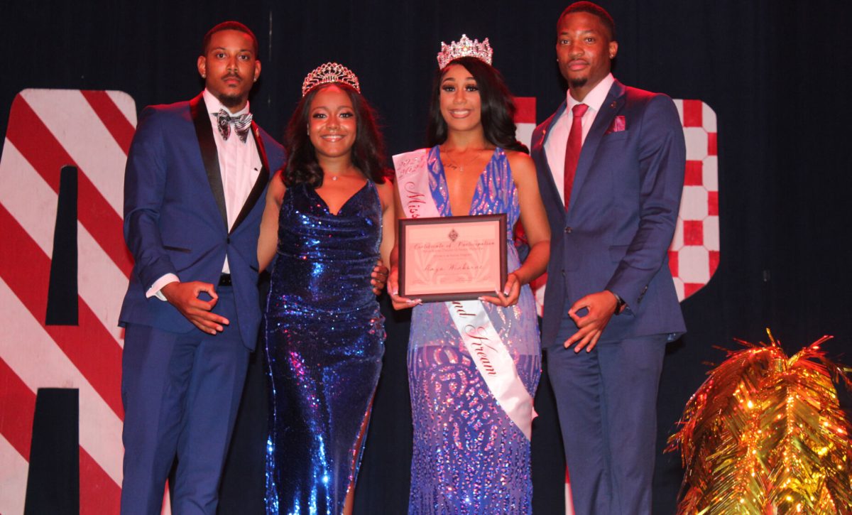 The Alpha Sigma Chapter of Kappa Alpha Psi Freaternity Inc. posing with the winner of the Miss Krimson and Kream pageant Amya Winborne. (Stefan Davis/ DIGEST)