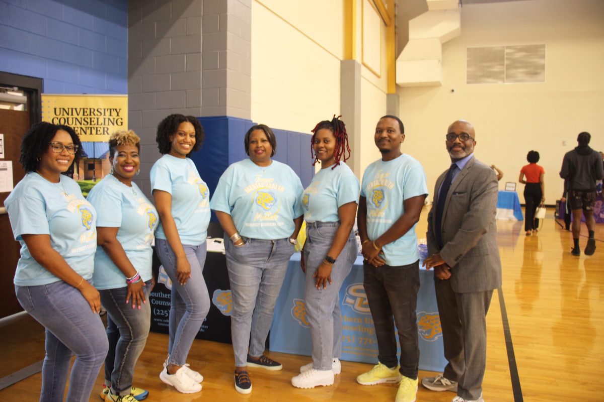 Staff of the University Counseling Center (UCC) and Executive Director Dr. ValaRay Irving (center), poses with &#160;F. Carl Walton, Vice-Chancellor for Student Affairs (far-right), at the UCC Meet &amp; Greet on Thursday, September 7 inside the intramural sports complex&#160;