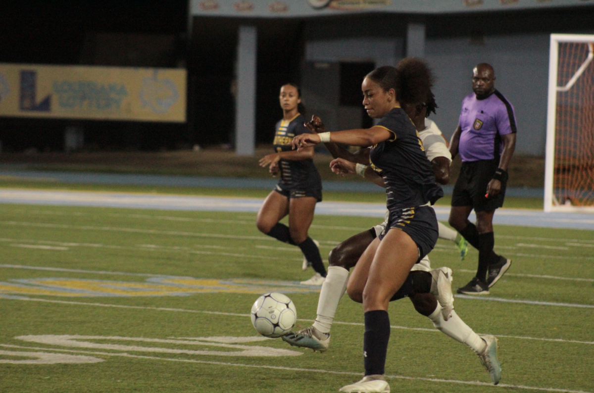 Middle Defender Ashante Gatlin fights for the ball against Mississippi Valley on September 22, 2023.