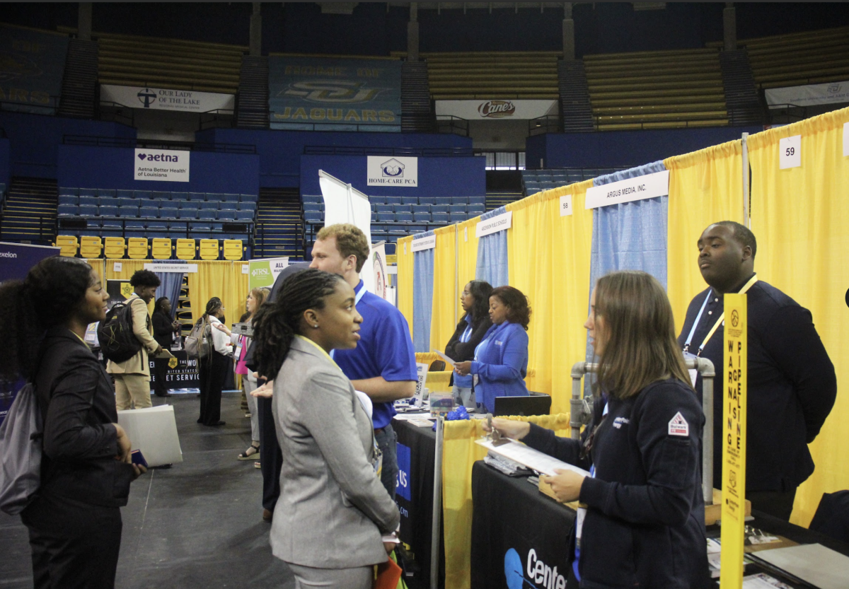 Companies at this years Career Fair interact with students, to inform them of open positions, internships, and to collect resumes on Wednesday, September 20th inside the F.G. Clark Activity Center.