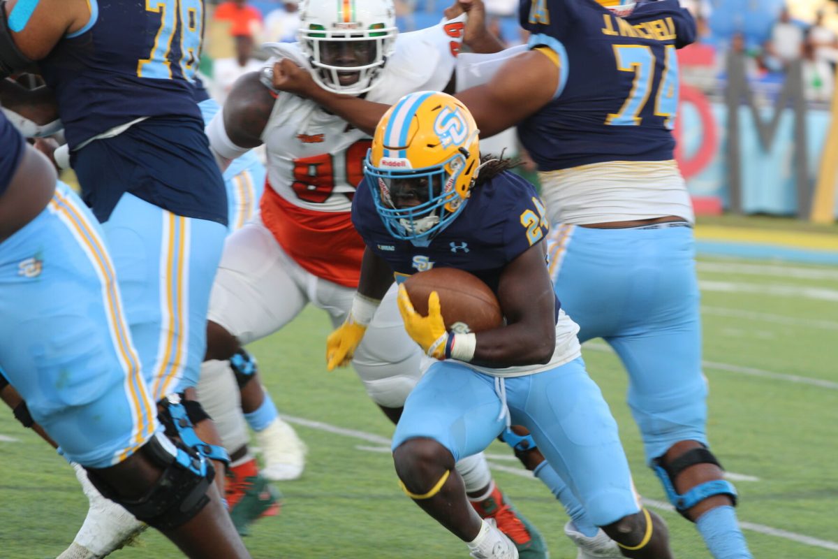 Knykolas Ross: Graduate student Gary Quarles Jr carries the ball against FAMU: 10/7