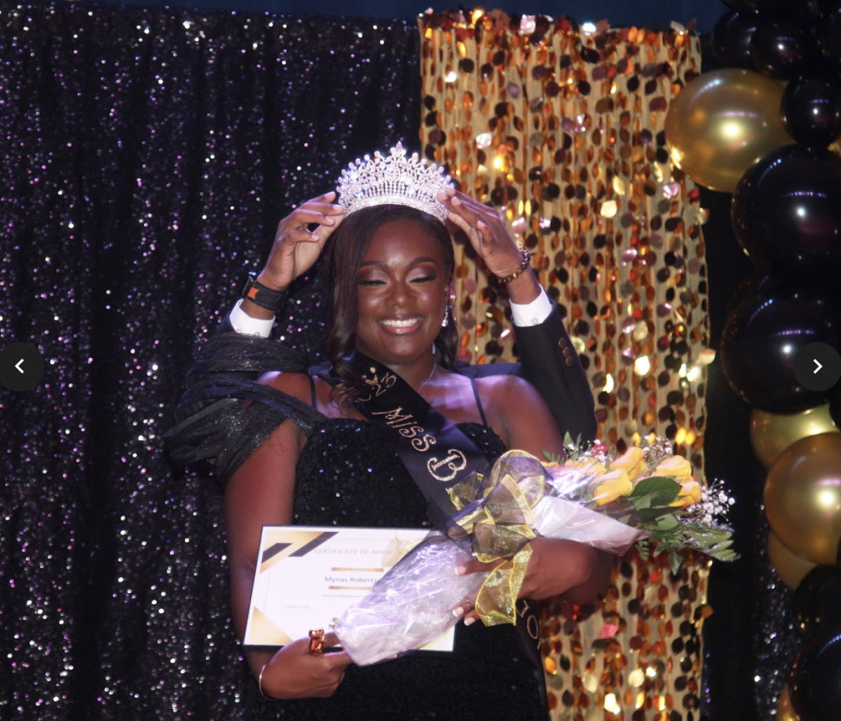 2024 Miss Black &amp; Gold &amp; Social Media Winner, Contestant Number Five, Miss Mynas Robertson is overjoyed as she receives her crown.&#160;