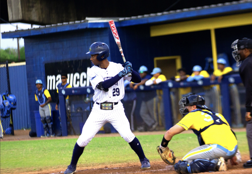 Junior, outfielder/first-baseman, Michael Latulas setting up to hit against SUNO on Lee-Hines Field March 20.