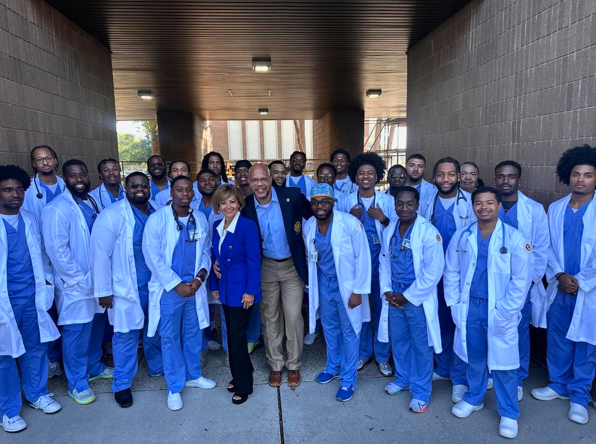 The Men of SUSON, stand ‘SUSON STRONG’ with the Dean Dr. Sandra C. Broad and Board Member Dr. Ronnie Whitfield after Friday’s Board of Supervisor’s Meeting. Credit: Instagram
