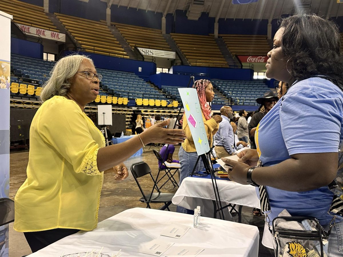 Director of the Student Health Center, Dr. Greta Wilkes chats with an Southern University employee about resources available at the University Health Center. 