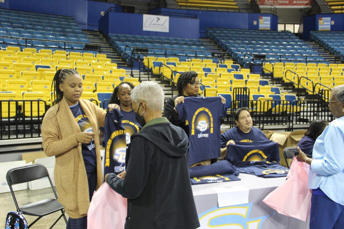 Faculty members recieving shirts during Employee Appreciation Day held in the F.G Clark Activity Center on October 10. 