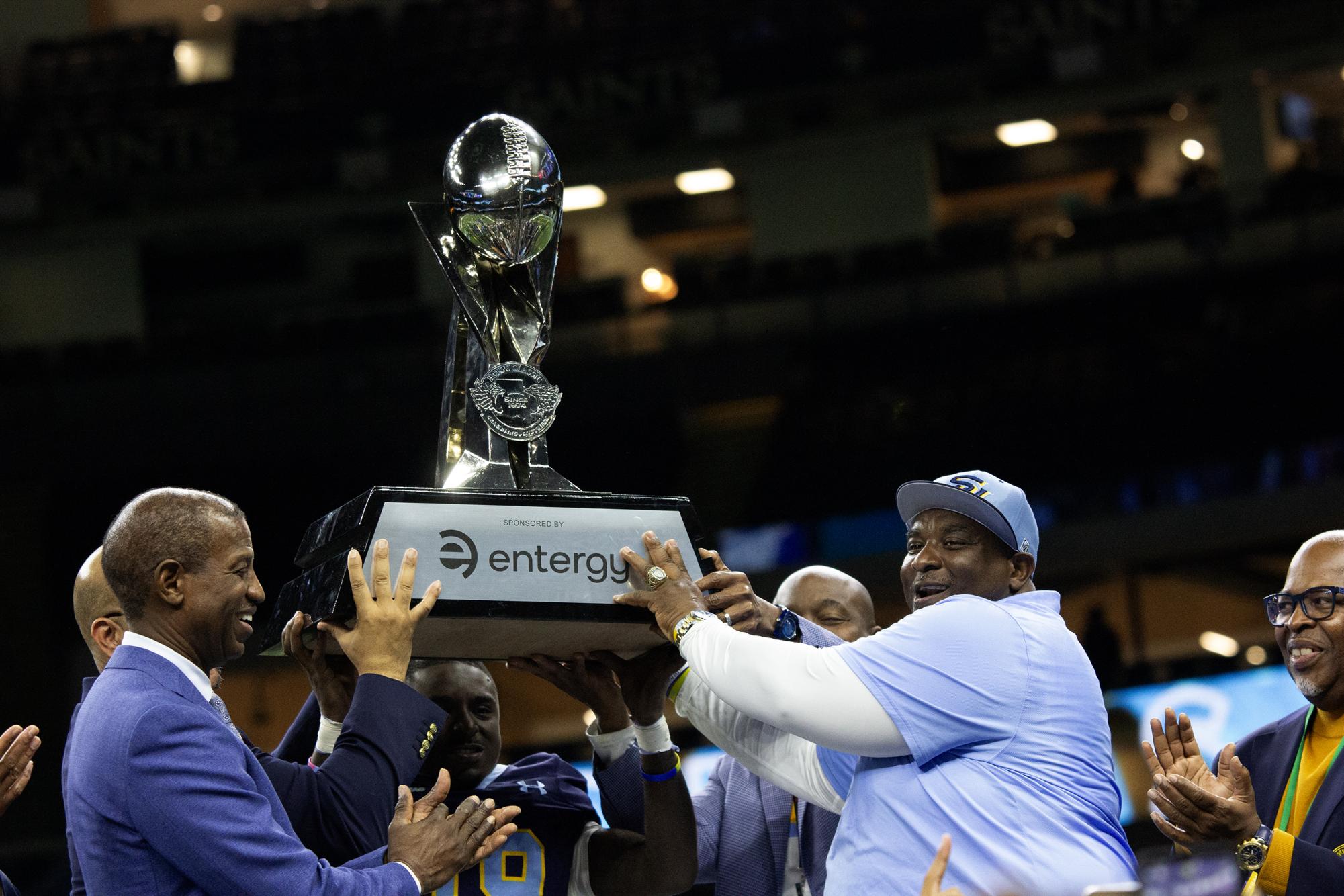 Southern University head coach Terrence Graves presented with the Bayou Classic trophy in Ceasars Superdome during 51st Bayou Classic on November 30.