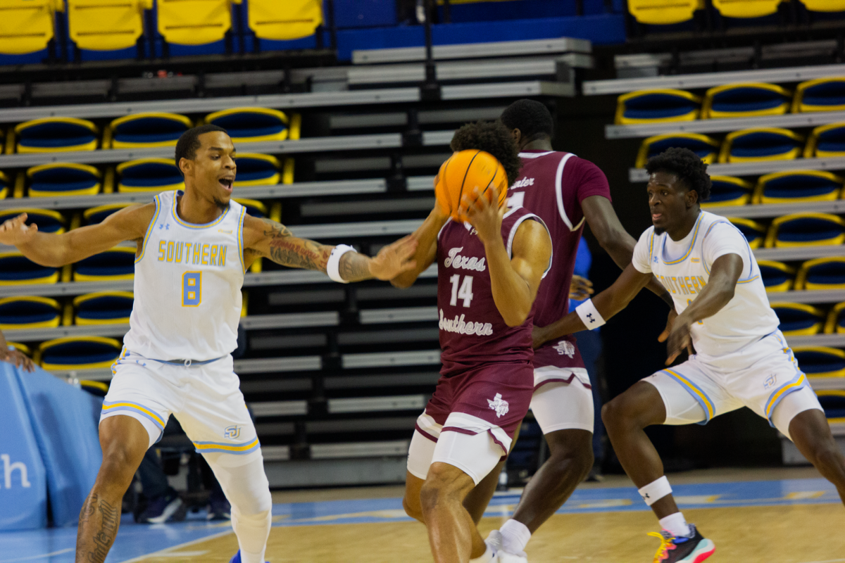 Redshirt, sophomore, center, Dionjahe Thomas, in his defensive stance against Texas Southern’s Kolby Granger.