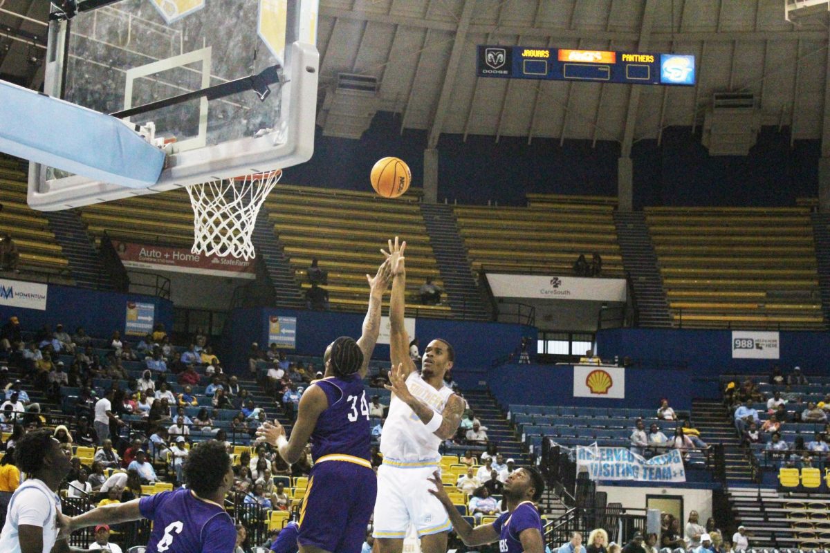 Sophomore center, Dionjahe Thomas, puts up a floater against Prairie View at the FG Clark Activity Center on Saturday, February 15.
