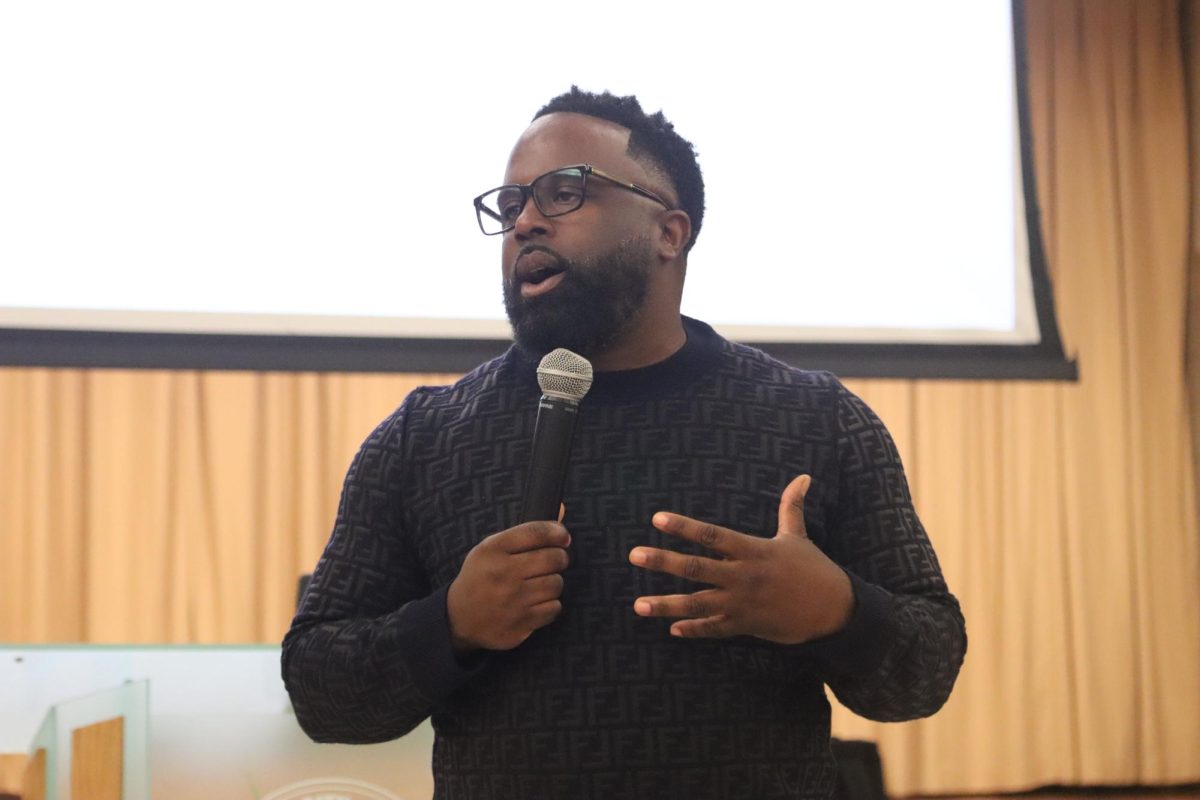 Dr. Jarrod D. Benjamin explaining to the students how our HBCUs play a crucial part in the success of the Black Student.