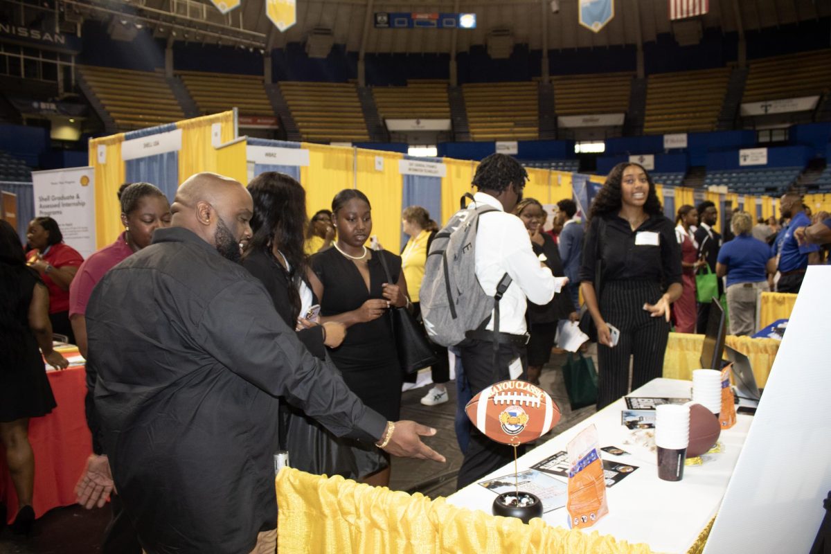 Students mingle at the Bayou Classic table during Career Fair at F.G. Clark Center on September 24. (