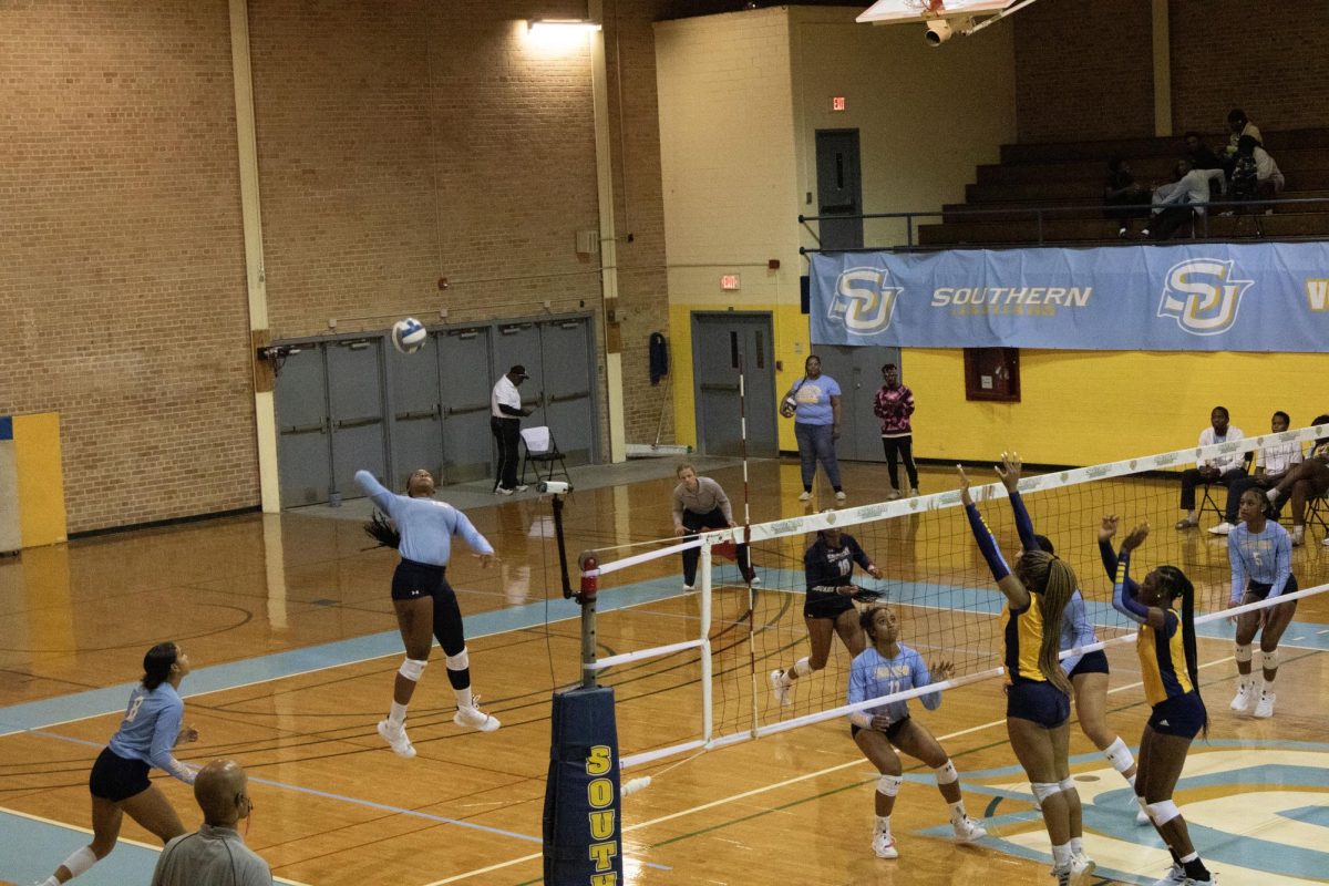 Graduate, Opposite Hitter, Bailee St. Roman spikes the ball during the matchup against SUNO in Seymour Gym on Tuesday, October 21.