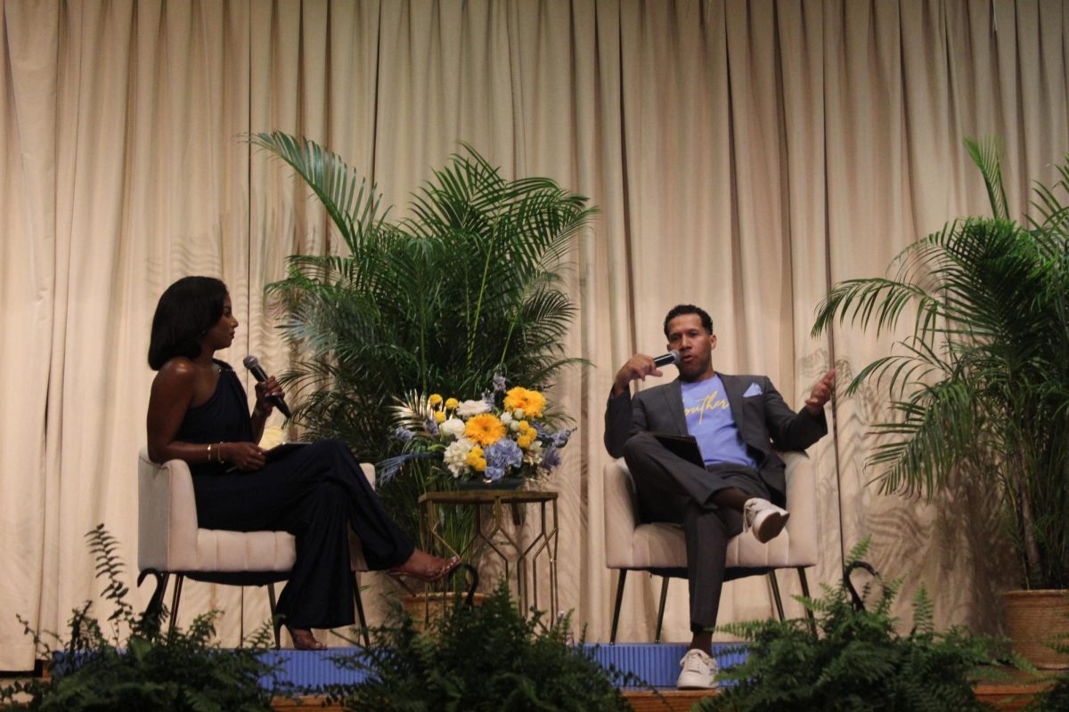 Host, Darby Smith and special guest, Lodric Collins having an insightful conversation in the Smith Brown Memorial Student Union Ballroom.