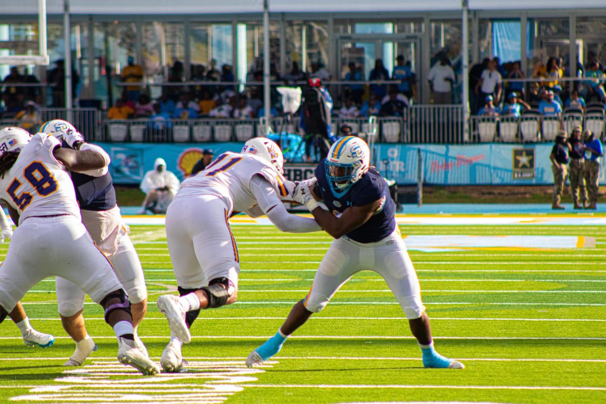 Senior, Defensive End, Ckelby Givens throwing offensive linemen off of him as the Southern University Jaguars took on the Prairie View and A&M College on October 18 ant A.W. Mumford Stadium