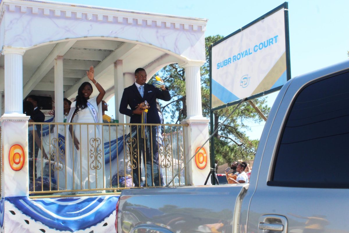 The 95th Miss Southern University Gala J. Marcus and her escort Khris Coleman waving to the crowd during the Homecoming parade hosted in the Scotlandville community on October 12. 