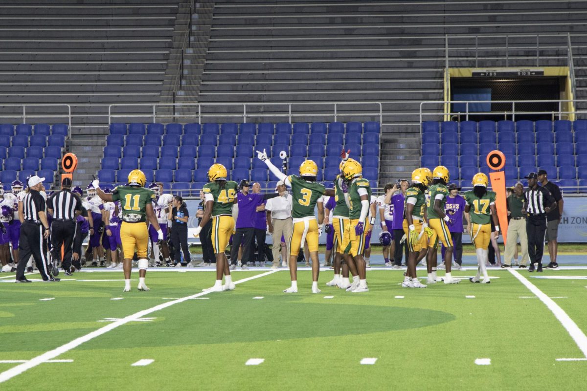 Southern Lab Defense celebrates an intercepted pass on the Dehnam Springs offense in the 3rd quarter of the game on October 2nd at A.W. Mumford Stadium. 
