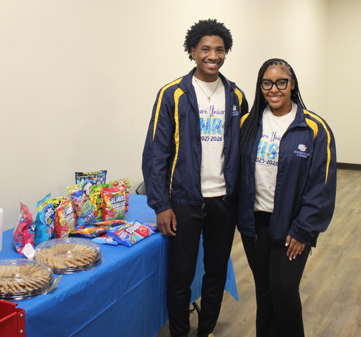 Mr. ResLife Curtis Williams and Mrs. ResLife Hannah Frank pictured at their karaoke and game night event in the Housing Annex on Monday, February 2. 