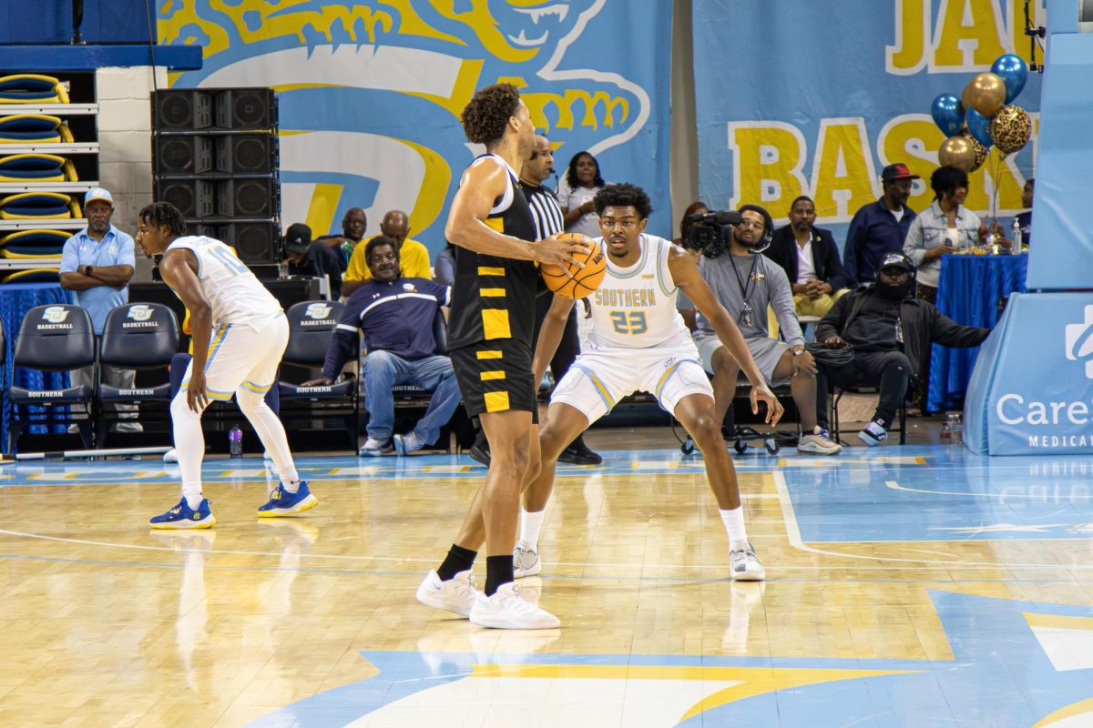 Senior Forward #23 Terrance Dixon Jr. plays defense on Saturday evening against Bethune Cookman at the F.G. Clark Activity Center.