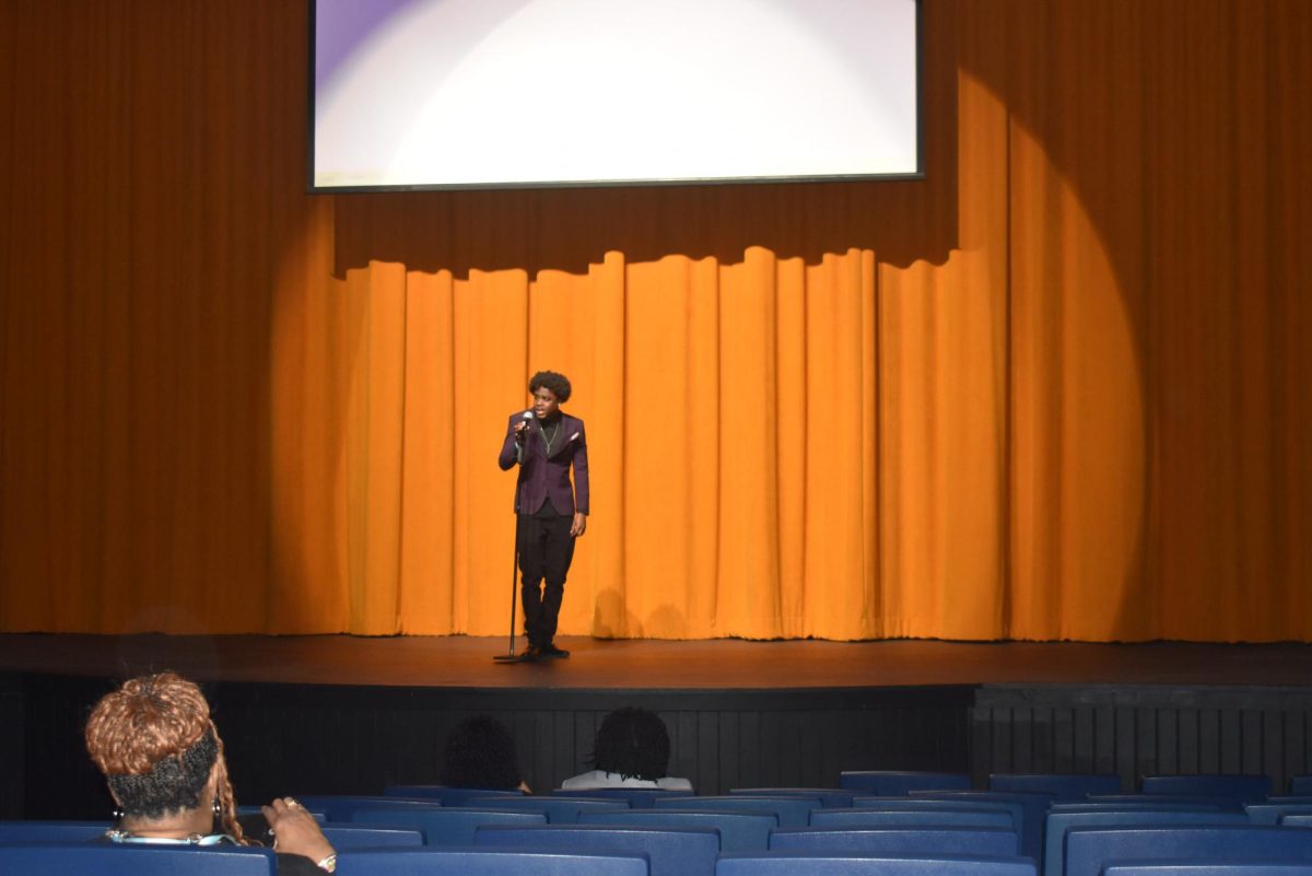 During the "Guess the Comedian" segment during Jag Night Live! on February 25 in Hayden theatre, a student performs a joke by a comedian Richard Pryor on stage as part of the live show. 