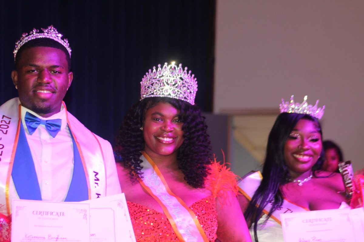 Winners Kyjameonne Bingham and Alexis Pines pose with the reigning Ms. Thicker Than a Snicker, Aryanna Hollingsworth.