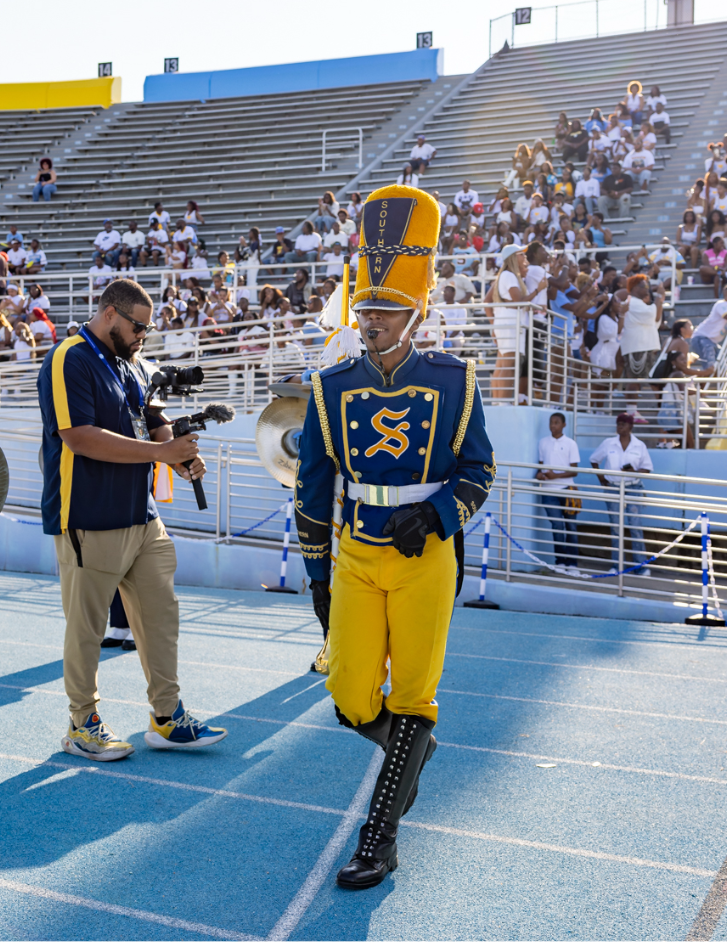 Drum major Demarcus J. Hill marches in Southern University’s A.W. Mumford Stadium while leading the Human Jukebox during the 2025 season.